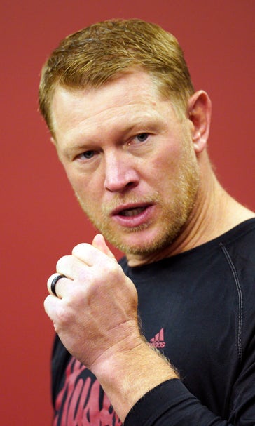 Girl arrested in connection with theft at Scott Frost's home